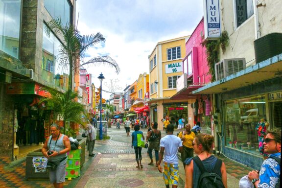 Bustling Street Scene with Pedestrians and Colorful Buildings Broad Street, a hub for shopping, dining, and business
