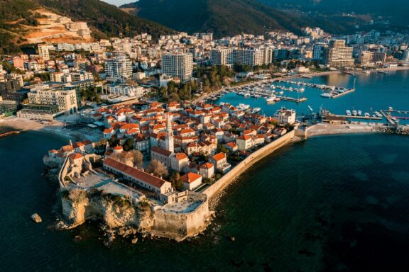 Aerial View of Budva Old Town and Marina, Montenegro The city of Budva, a sought-after coastal locale