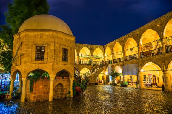 Illuminated Courtyard of Büyük Han at Night Buyuk Han, built in 1572, this caravanserai is one of the finest examples of Ottoman architecture in Cyprus