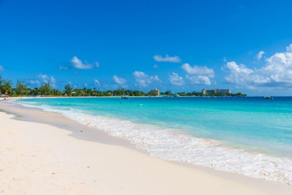 Tropical Beach with Clear Blue Water and White Sand Carlisle Bay, known for its clear waters and shipwrecks