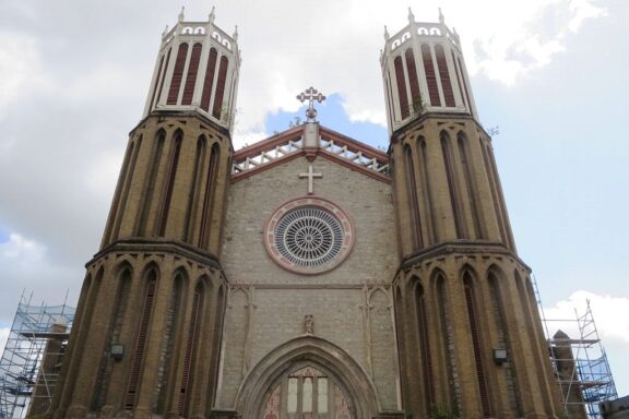 Cathedral Facade Against Cloudy Sky The Cathedral of the Immaculate Conception