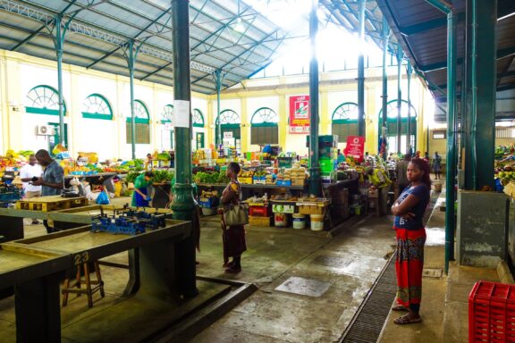 Indoor Market Scene in Maputo Mercado Central, offering a diverse range of goods, from fresh food to crafts