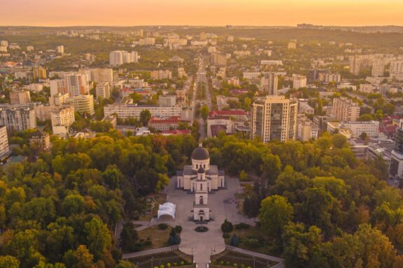 Aerial View of Chisinau Cityscape at Sunset Cityscape of Chisinau with Central Park in the foreground