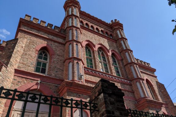 Brick Gothic Church Facade with Arched Windows Coke Memorial Methodist Church, named after Thomas Coke, a founder of Methodist missions
