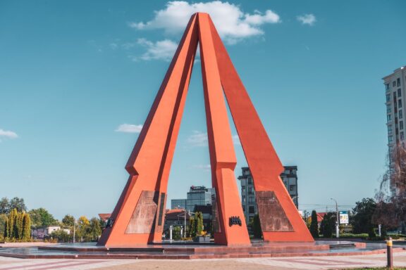Red Triangular Monument in Urban Park "Eternitate" Memorial Complex, dedicated to Moldovan soldiers who died during World War II