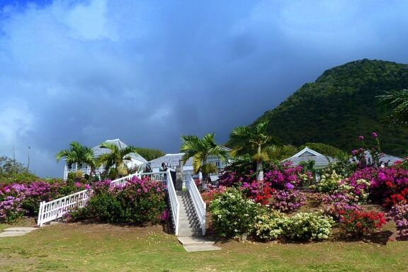 Tropical Estate with Lush Gardens and Mountain View Fairview Great House & Botanical Garden, dating back to the 18th century