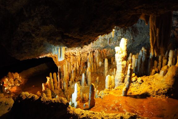 Luminous Cave Interior with Stalactites and Stalagmites Harrison's Cave, a glimpse into the island's unique geological formations
