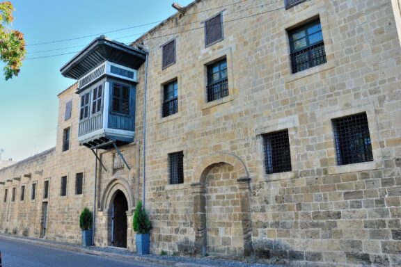 Traditional Stone Building with Wooden Balcony The House of Hadjigeorgakis Kornesios, an 18th-century mansion that once belonged to a prominent dragoman