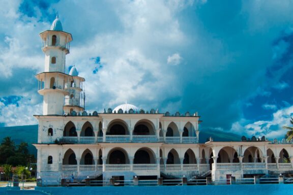 White Mosque with Blue Sky Iconi Mosque, a worship center, and community hub