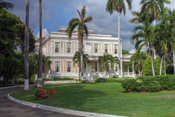Devon House Mansion in Kingston Surrounded by Palm Trees Devon House, built in 1881 by George Stiebel