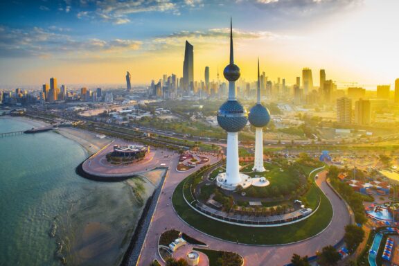 Sunset View of Kuwait Towers and City Skyline Kuwait Towers, a functional and symbolic landmark designed by Swedish engineering company VBB