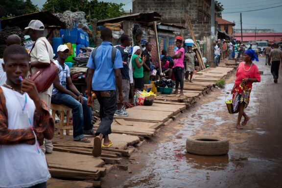 Bustling Street Market Scene Crowded, bustling intersections near markets in Freetown