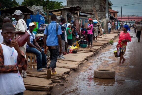 Crowded, bustling intersections near markets in Freetown