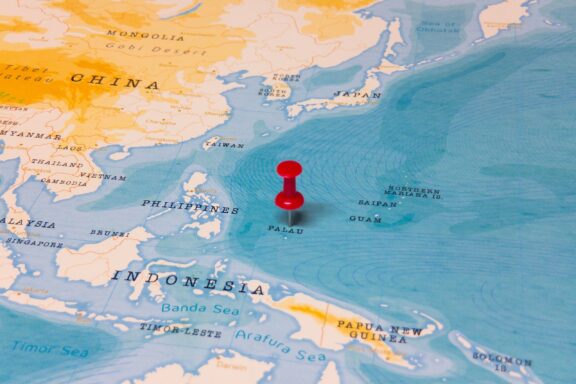 Red Pin on Map at Ngerulmud, Palau Location Location of Palau on the Global Map