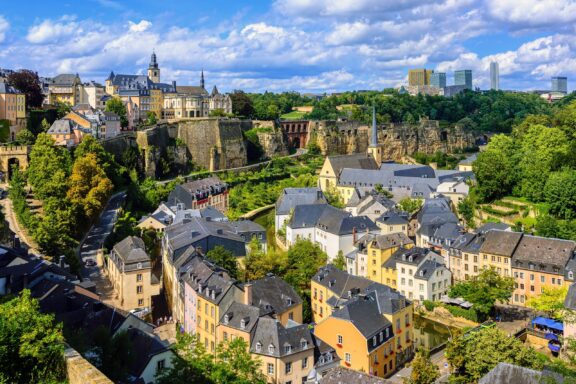 Luxembourg Cityscape with Historic Buildings and Greenery Cityscape of Luxembourg City, reflecting a blend of its medieval origins and modern European influences