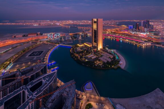 Night skyline of Bahrain with the Four Seasons Hotel in the foreground