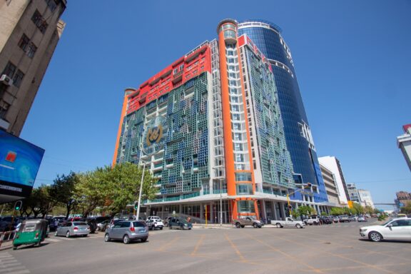 Downtown Maputo with Modern Buildings and Traffic Mozambique Baixa area, a key square in Maputo's economy