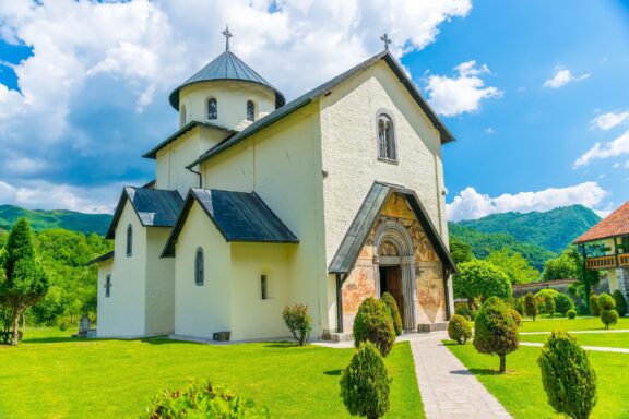 Moraca Monastery in Lush Green Setting Moraca Monastery, founded in the 13th century by Prince Stefan Nemanjic