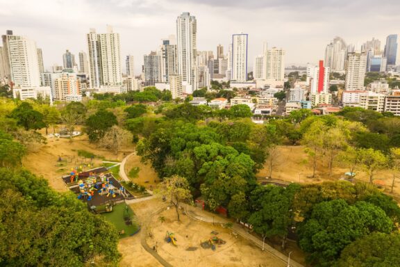 Aerial View of Urban Park and City Skyline Parque Omar, once a golf course, it was transformed into an urban oasis offering recreational and cultural spaces