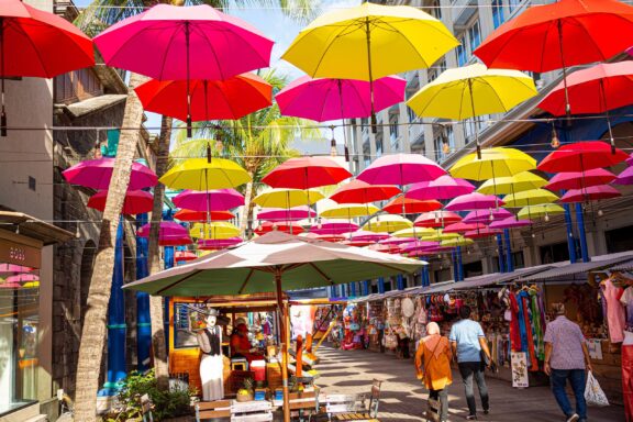 Colorful Umbrellas Over Outdoor Market Street Central Market, established in 1828