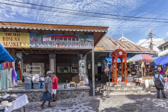 Old Market in Roseau with Shoppers and Stalls The Old Market, once a slave market during the colonial era