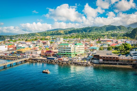 Coastal City Skyline with Mountains in the Background The skyline of Roseau, capital of Dominica