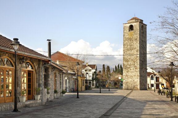 Old Clock Tower and Cobblestone Street Sahat Kula, built in the 18th century, stands as a historical timekeeper
