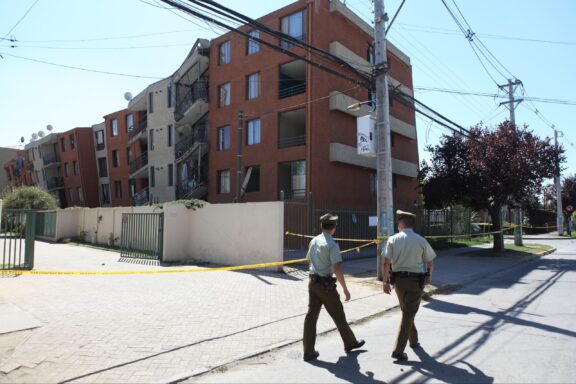 Police walk by a building with structural damage in Santiago, Chile in 2010 after one of the biggest earthquakes in the world. 