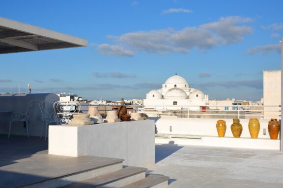 Mosque with White Dome Viewed from Rooftop Terrace Sidi-Mahrez Mosque, named after the patron saint of Tunis