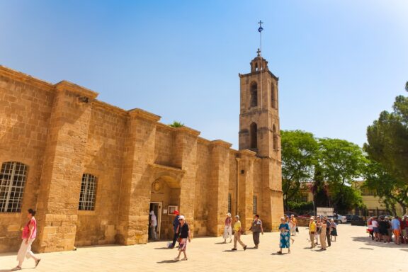 Visitors Outside Historic Cathedral on Sunny Day St. John Cathedral, built in the 17th century