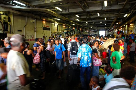 Crowded Indoor Area with People Suva residents getting off the ferry boats, a vital hub for maritime transport within Fiji’s archipelago