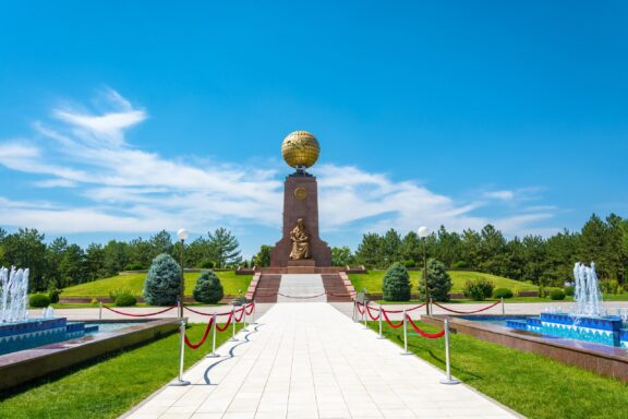 Independence Square Monument in Tashkent under Blue Sky Independence Square, commemorating Uzbekistan's independence from the Soviet Union in 1991