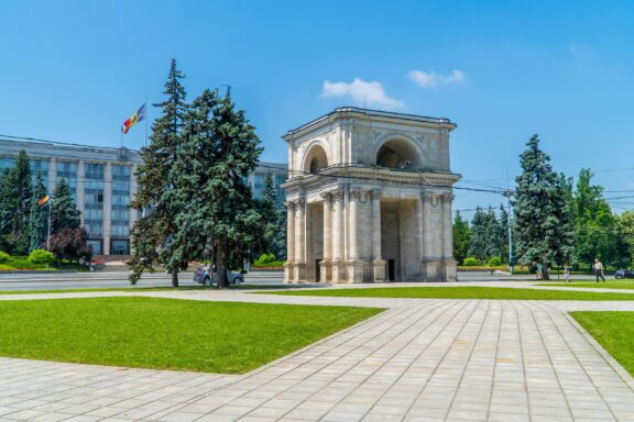 Triumphal Arch in a City Park on a Sunny Day Triumphal Arch, commemorating the Russo-Turkish War and Moldova's historic milestones
