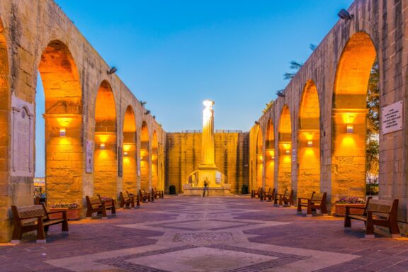 Twilight at Upper Barrakka Gardens with Arched Pathway Upper Barrakka Gardens, initially constructed as a private sanctuary for the Knights of St. John