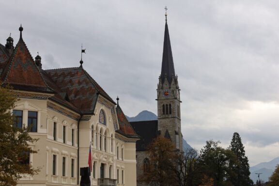 Old Town Buildings with Spire in Vaduz Old Town of Vaduz, offering a journey back in time, uncovering the city's roots in medieval history