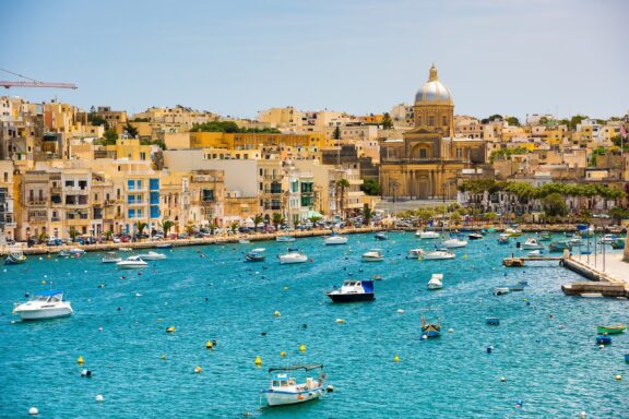 Harbor View with Yachts and Cityscape Maritime activities in Valletta, significantly contribute to Malta's tourism industry