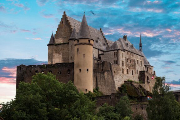 Vianden Castle at Dusk Vianden Castle, a medieval fortress dating back to the 10th century