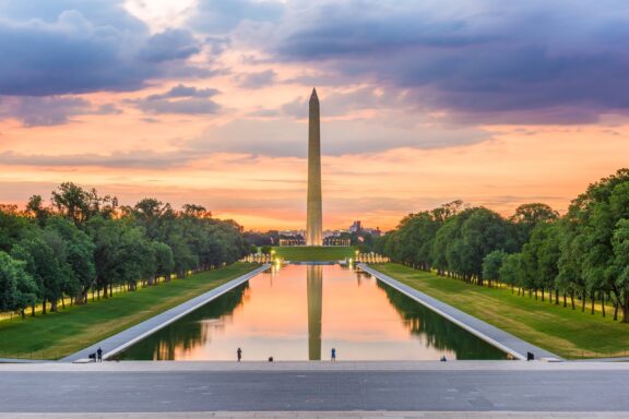 Washington Monument at Dusk WWII Memorial and Washington Monument within the National Mall of USA