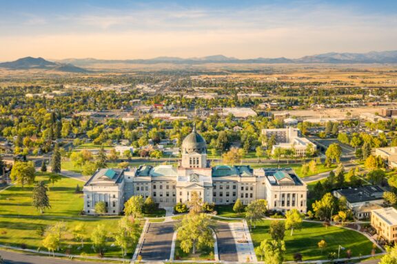 An aerial image of the State Capital in Helena, Montana, taken by a drone on a sunny day.