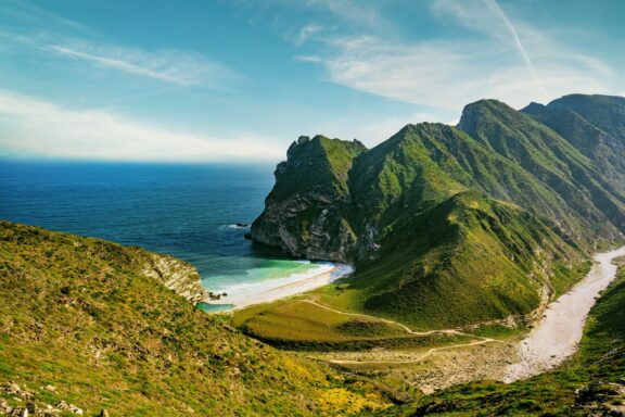 A view of Al Mughsail Beach from atop a mountain in Salalah, Oman.