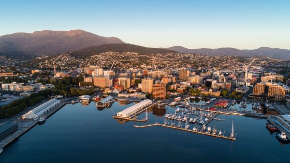 Aerial View of Hobart Harbour at Dawn with Mount Wellington in the Background, Tasmania An aerial view of Hobart Harbour at dawn in the Australian state of Tasmania.