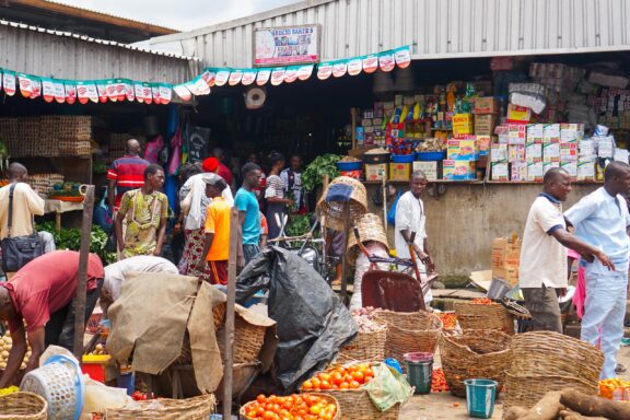 Bustling Local Market Scene Crowded market in Abuja, a bustling hub of commerce and culture