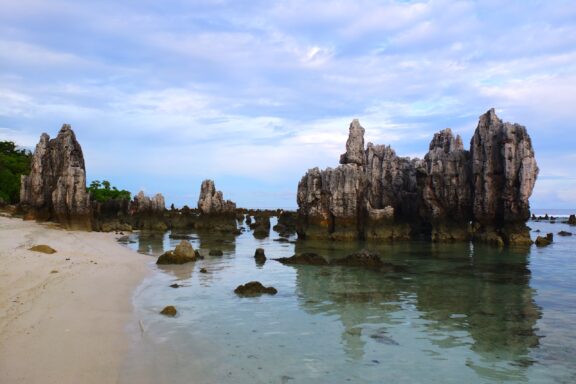 Coral Rocks at Anibare Bay Beach Anibare Bay, known for its stunning vistas and coral reefs