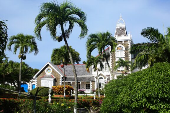 Tropical Colonial Government House with Palm Trees Government House in Castries, the official residence of St. Lucia's Governor-General