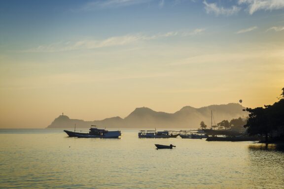 Dili Harbor at Sunset Boats at Dili's harbor, a critical hub for the country's economy