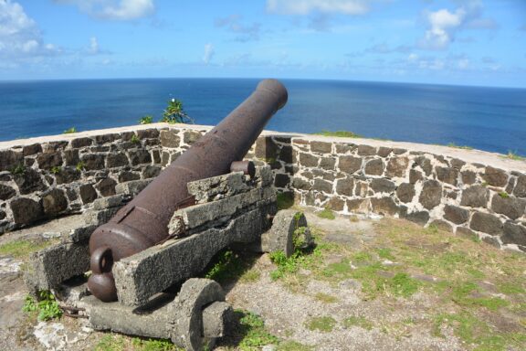 Old Cannon on Fort Rodney Overlooking the Sea Fort Rodney, used by the British to spy on French ships
