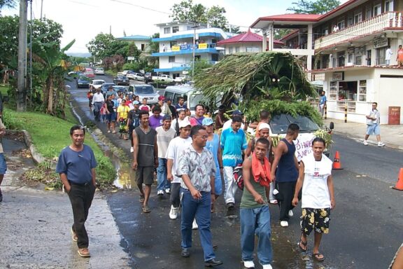 Parade on a Town Street Fsm founding day