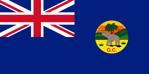 Historical flag of the Ghana Colony with the Union Jack in the top left corner and a shield featuring an elephant and palm tree on a blue background with the initials G.C.