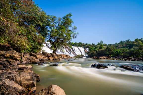 Serene Waterfall and River Landscape Gurara Waterfalls: A natural wonder located near Abuja