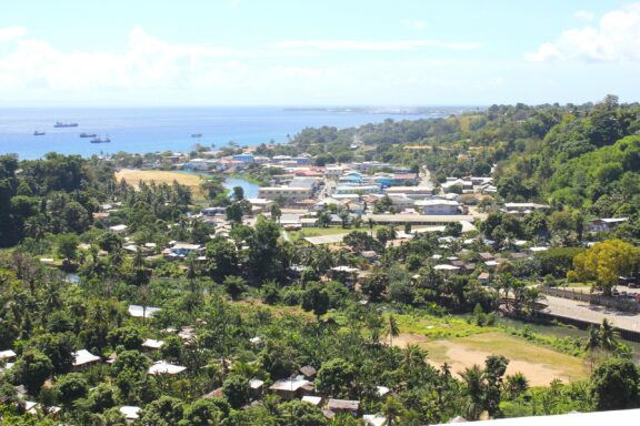 Tropical Coastal Town Landscape The city of Honiara, a blend of urban and natural elements